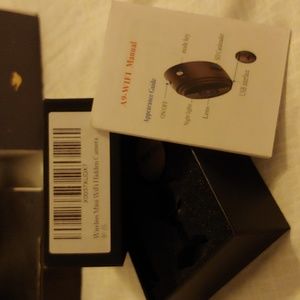 Wireless Mini Wi-Fi Hidden Camera. Really small an black. Doesn't have brand